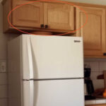 How to Use Those ‘Useless’ Cupboards Above the Fridge