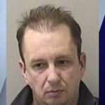 Alleged luxury car thief arrested with bevy of fraud tools, guns and drugs in suburbs