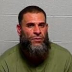 Docs: Suburban man accused of picking up stranger, holding her against will for over a week