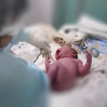 Doctors deliver baby prematurely after mother is injured in drone attack