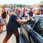 I Witnessed a Biker Shatter a Luxury BMW Window at the Mall