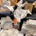 ST. A man was arrested near Louisville this week for allegedly disguising more than 50 pounds of methamphetamine as Christmas presents.