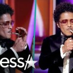 Bruno Mars lights up cigarette on stage after winning Record of the Year at Grammys